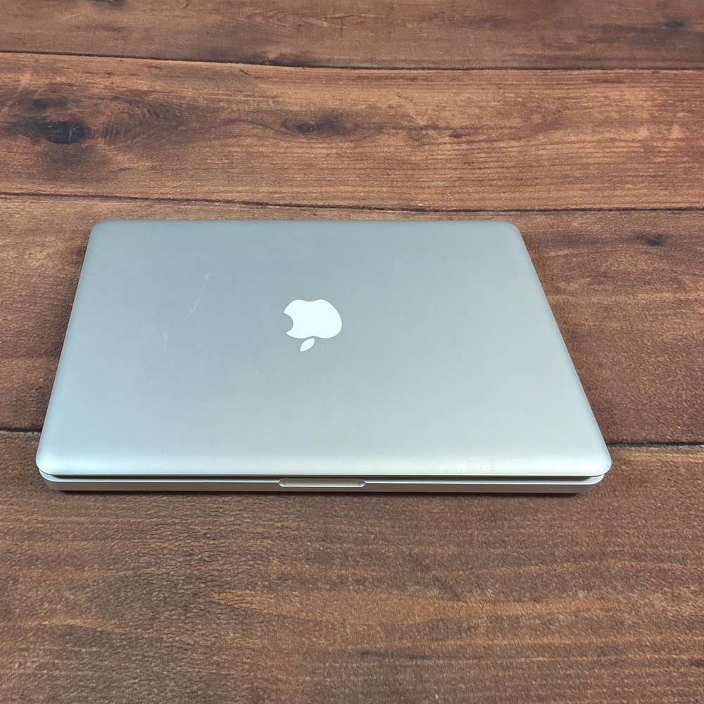Apple MacBook Pro Laptop Silver Fair Lifting Trackpad Parts Repair